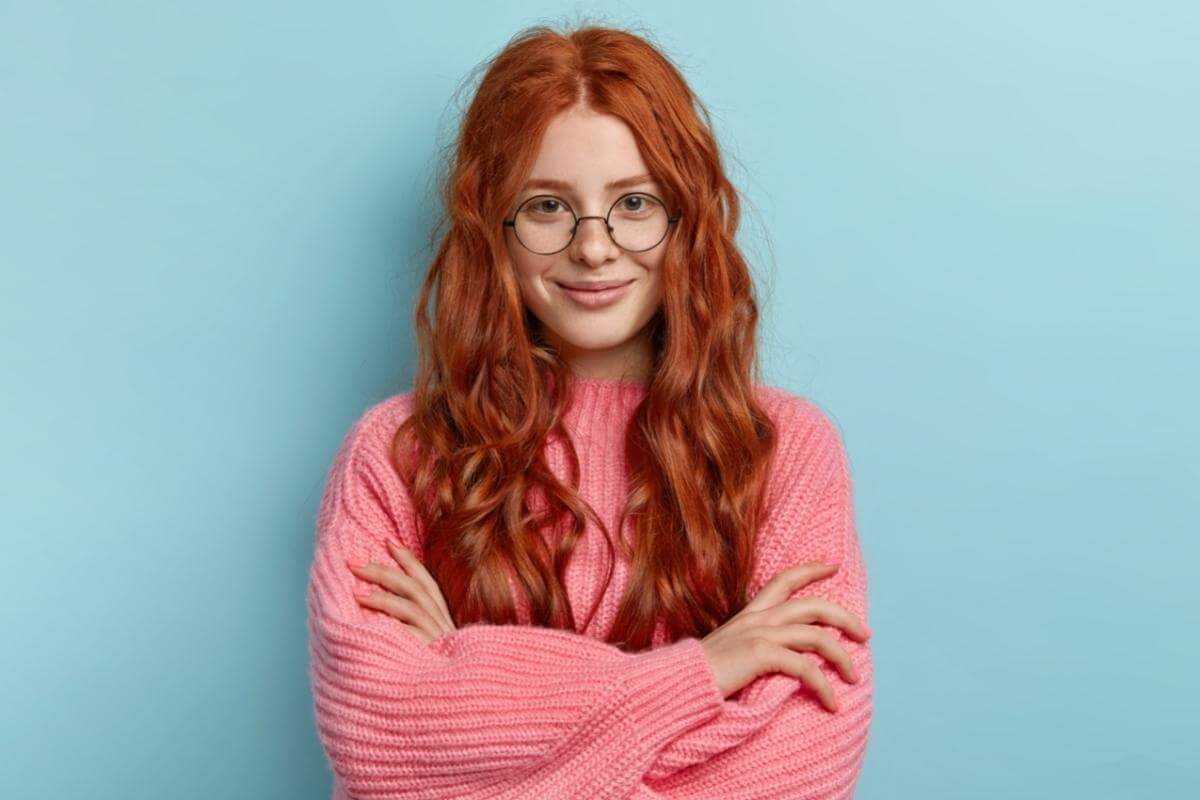 how to lighten red hair to blonde without orange tones