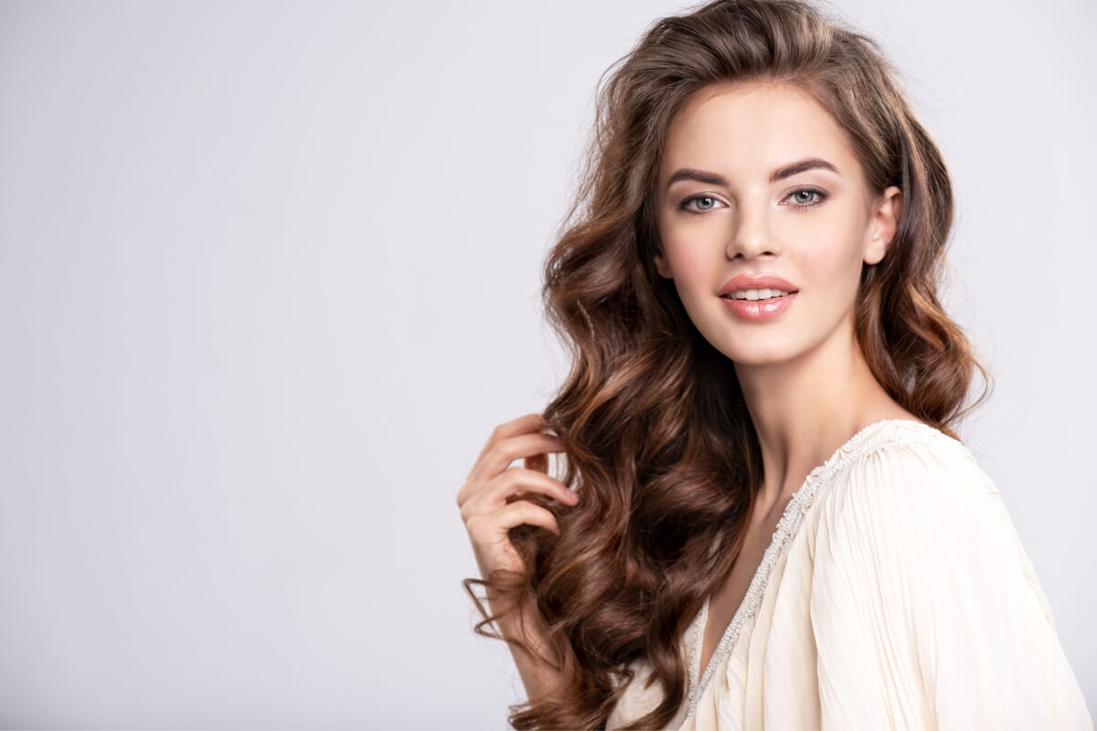 best hairstyles to achieve voluminous hair without frizz