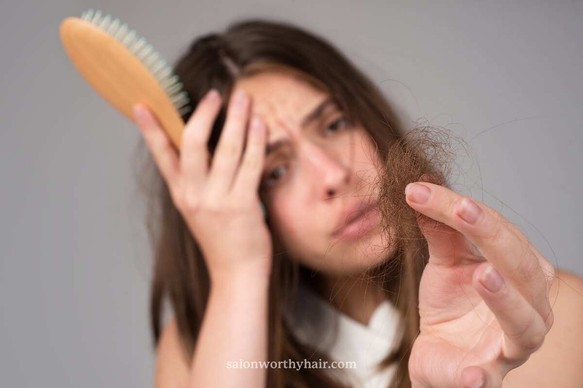 too much purple shampoo may cause dryness and breakage but not hair loss