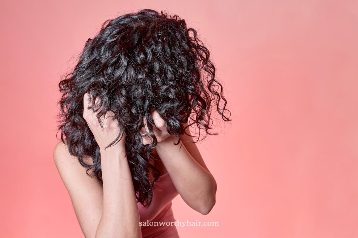 learn how to fix frizzy hair near the roots