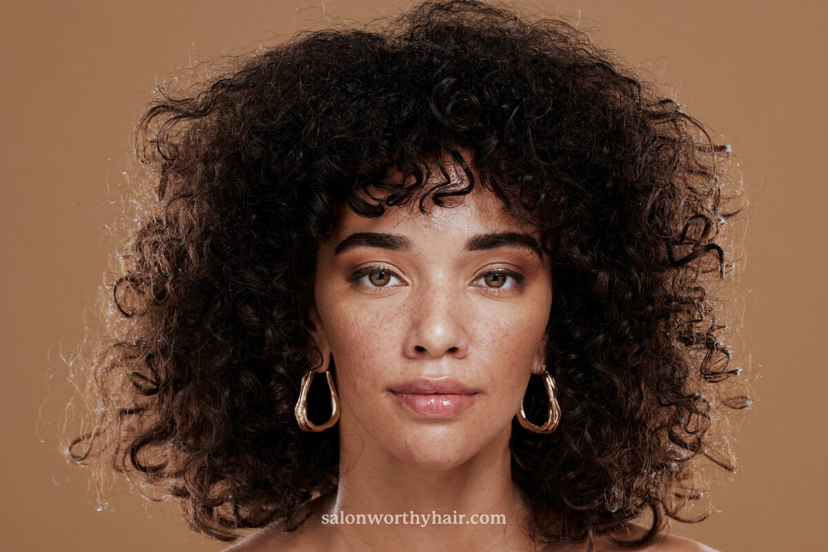 natural hair and curls are more prone to frizz and messy curl definition from humidity and washing