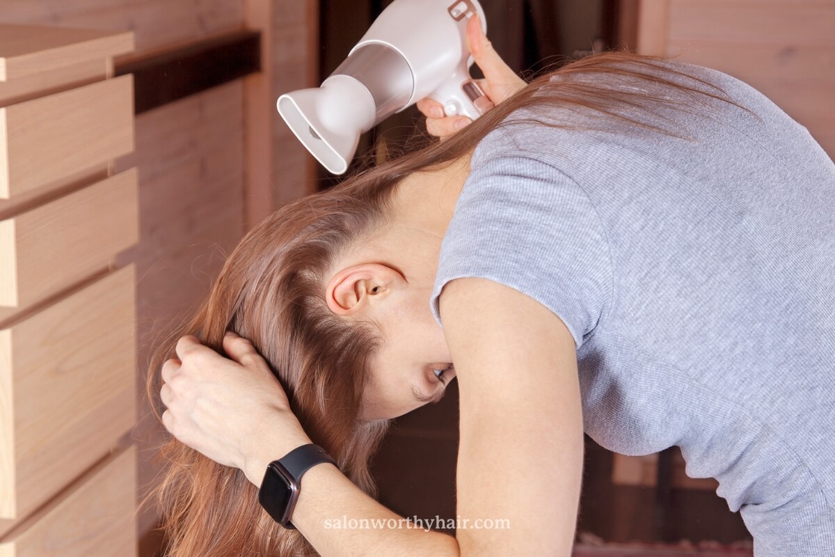 blow drying hair upside down makes hair fluffy