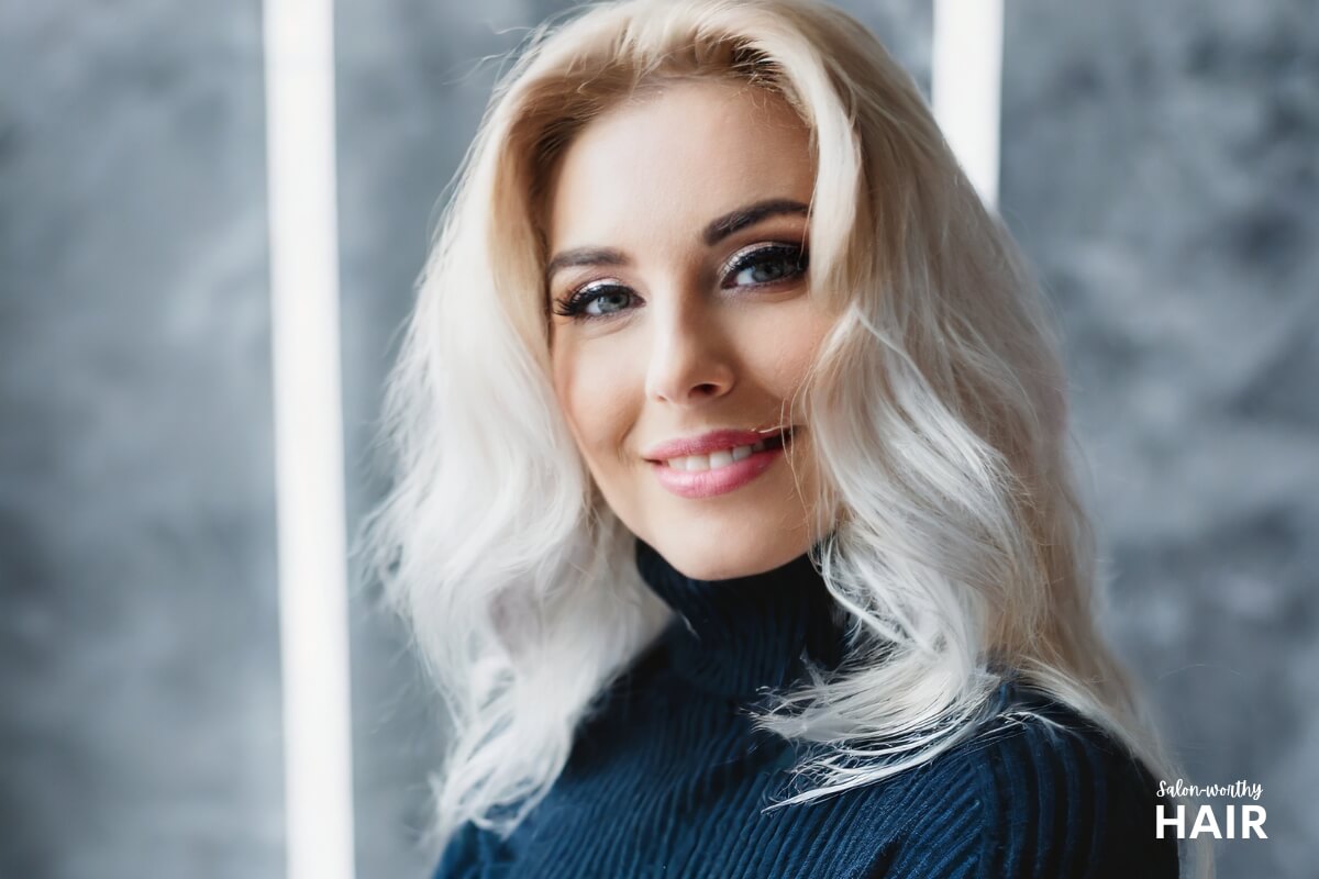 Cool blonde has ashy undertones, complementing pink or bluish skin, often with hints of silver or blue shimmer.
