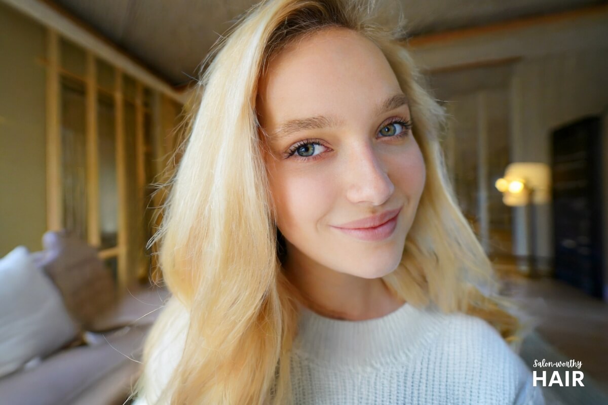 Light blonde hair is a luminous shade with sun-kissed undertones, blending ethereal glow and natural brightness, accented by subtle icy and golden hints.