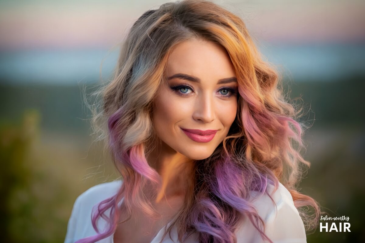 Sunset blonde is a warm blend of oranges, reds, and purples, reflecting vibrant sunset hues on blonde base.