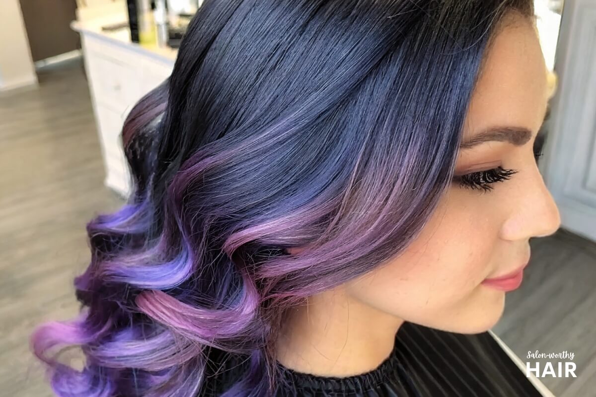 photo of woman showing how purple highlights look on black hair